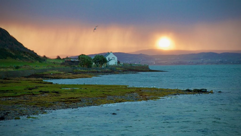 Sunrise over an Irish farmhouse on Trawbreaga Bay near Malin Head, County Donegal
